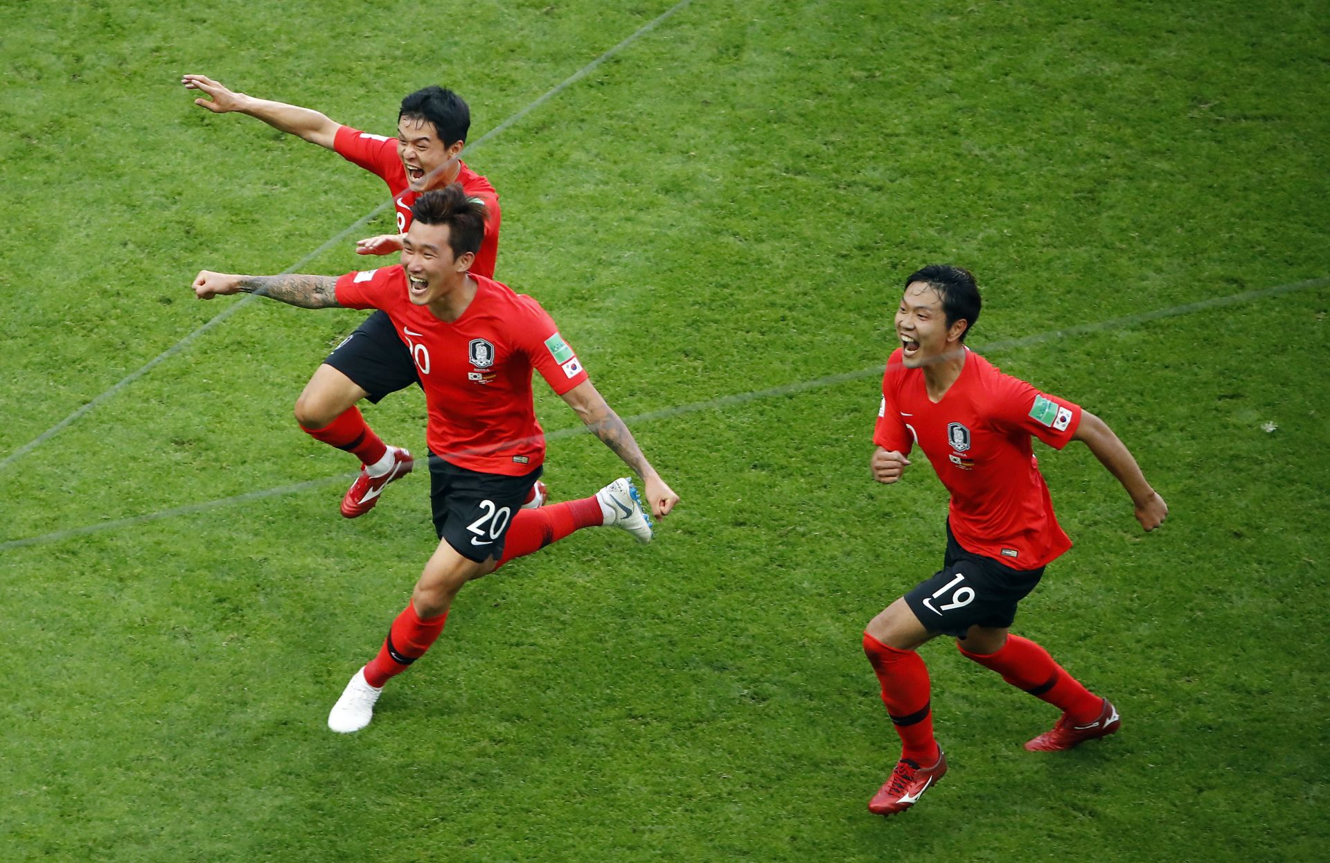 Players of South Korea react after scoring the 1-0 during the FIFA World Cup 2018 group F preliminary round soccer match between South Korea and Germany in Kazan, Russia, 27 June 2018.